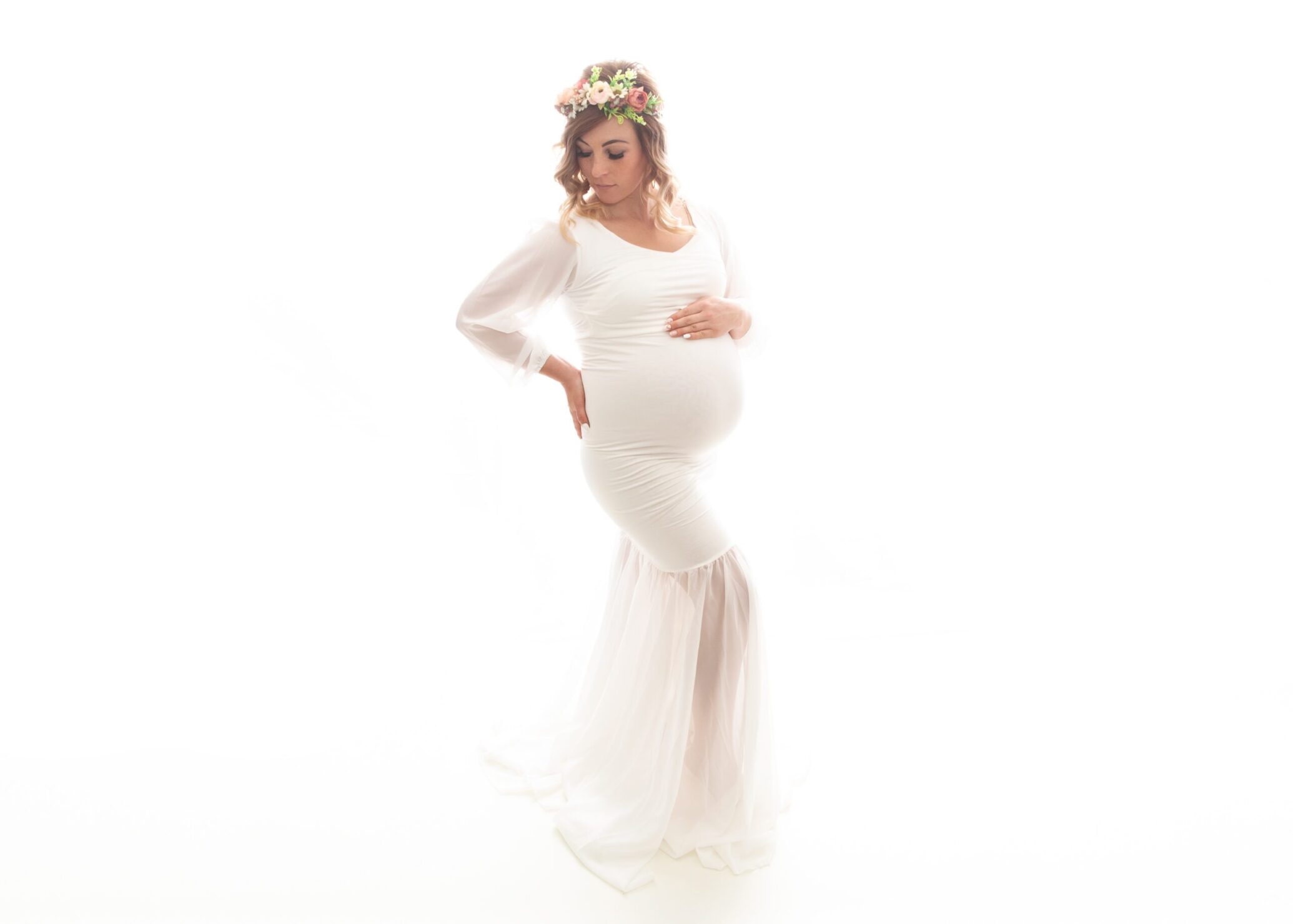 mom in white dress with flowers