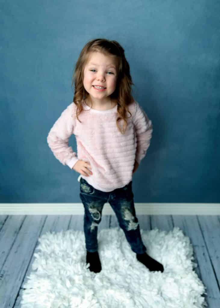 child session girl in pink shirt