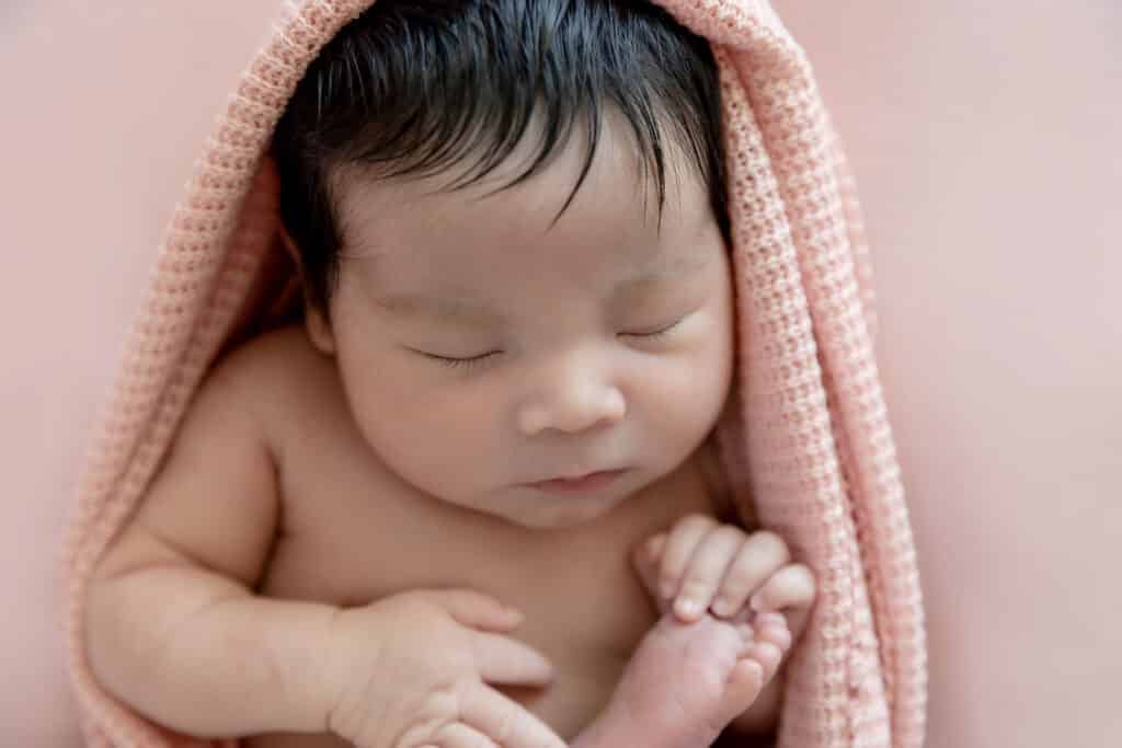 utah county newborn photographer near me baby holding toes