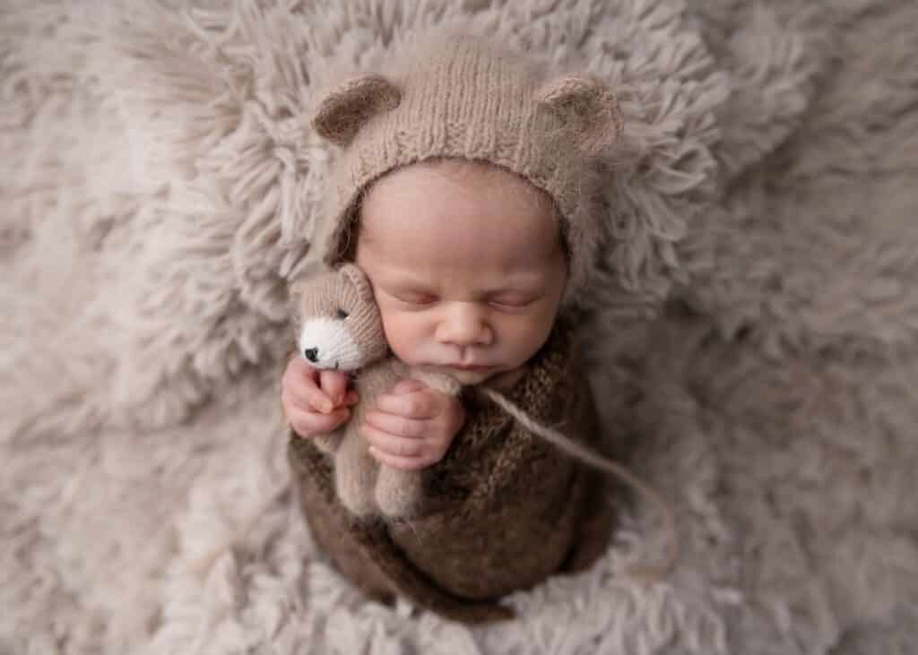 baby with teddy bear