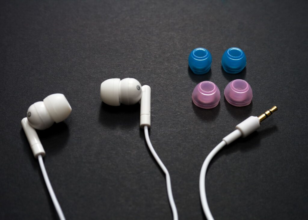 earbuds with wires and colored ear buds