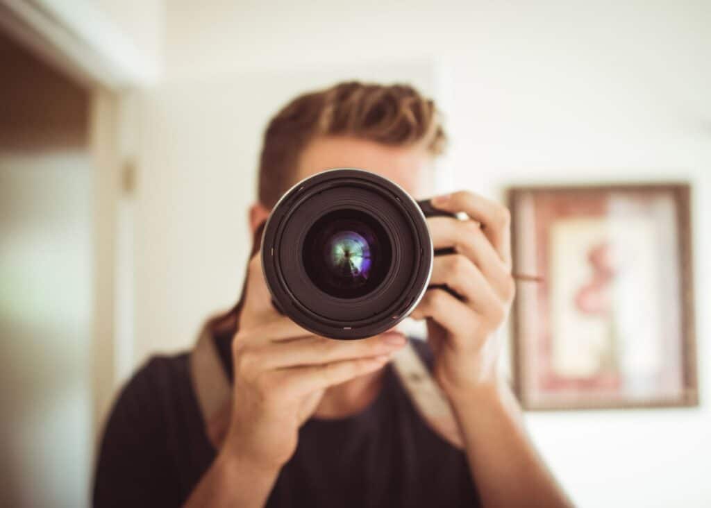 man holding camera